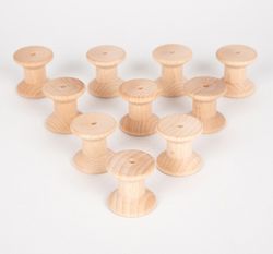 Carretes de madera para juego heurístico