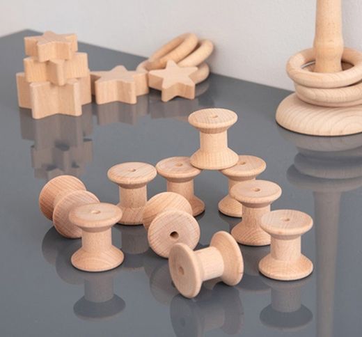 Carretes de madera para juego heurístico