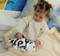 Peluche sensorial luminoso y sonoro Camaleón