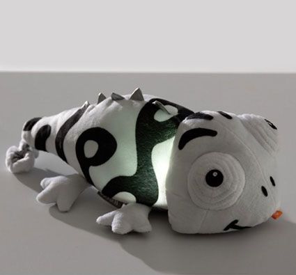 Peluche sensorial luminoso y sonoro Camaleón