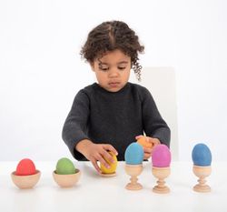 Huevos de madera arcoíris