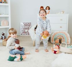 Muñeco bebé africano con cuerpo blando 32cm