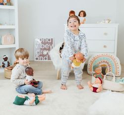 Muñeco bebé africano con cuerpo blando 32cm