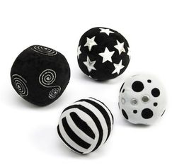Pelotas de actividad sensorial blandas en blanco y negro